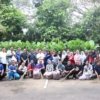 Pegawai Diskominfosantik Kabupaten Bekasi melakukan aksi bersih-bersih lingkungan kantor dalam kegiatan Jumat Bersih di Cikarang Pusat.