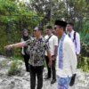Plt Bupati Bekasi Asep Surya Atmaja meninjau kondisi jalan rusak di Desa Karangmulya, Bojongmangu, yang menjadi jalur penghubung antarwilayah